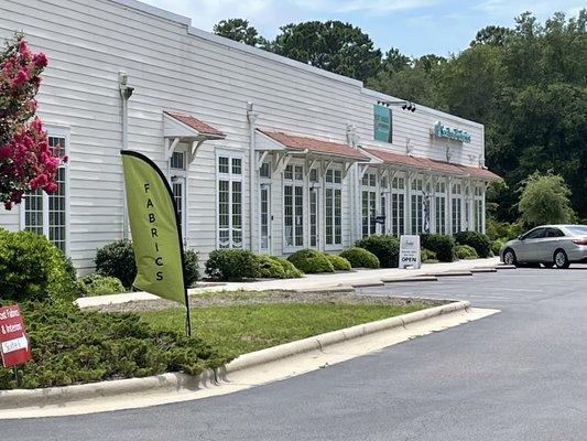 Store front faces Robert Ruark Drive.