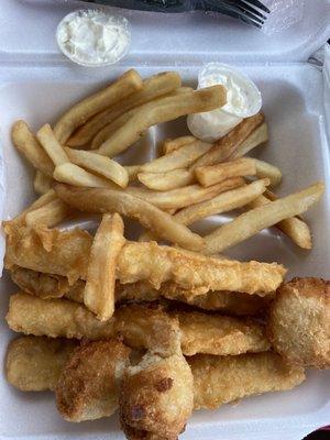 Fish fries and tiny container of tartar