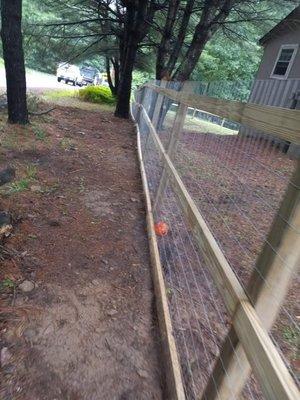 Fencing installed by ODs Home Improvements to keep a customers dog's in his yard.