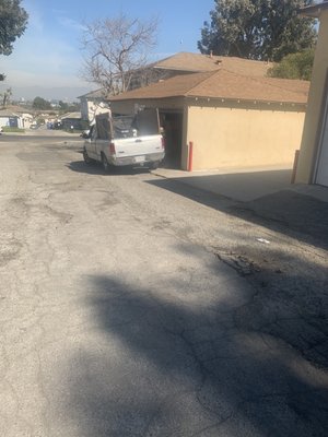 The maintenance crew parking there car near garage and clearly state no parking or Tow Zone. This everyday .