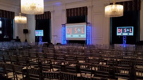 Screens and audio for presentations at the DCCC Political Update during the DNC