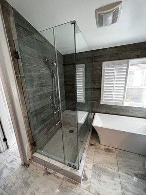 Rebuilt shower pan/reinstalled glass door/hot mop