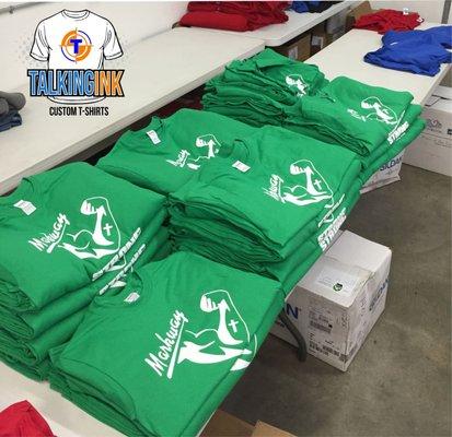 Shirts printed, folded, and ready to box and ship at Talkingink custom t-shirts.