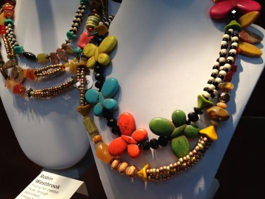 We represent about 20 local artists. You will find a vibrant selection of jewelry, paintings and sculpture.