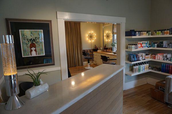 inside the salon, at the front desk