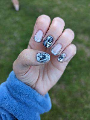 Gel manicure with nail art and sticker art