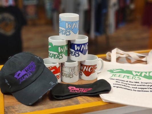 Organization branded merchandise, mugs, hats totes, headbands.