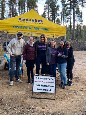 Prescott branch - Guild Mortgage cheering providing water at the Prescott WRM