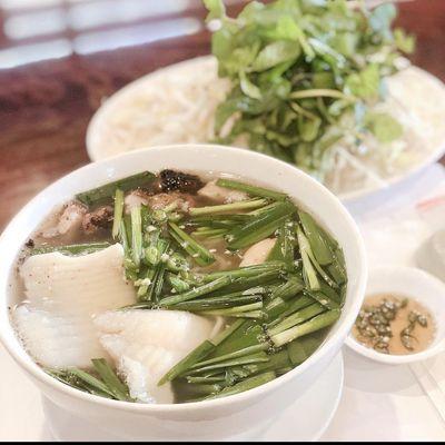 Bún Nước Lèo (#1 Vermicelli Rice Noodles Soup) - this includes shrimp, fish, roasted pork, chives and veggies on the side