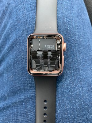 Apple Watch with display popped off.