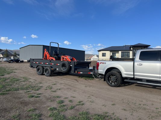 Mini backhoe, tractor and dump trailer