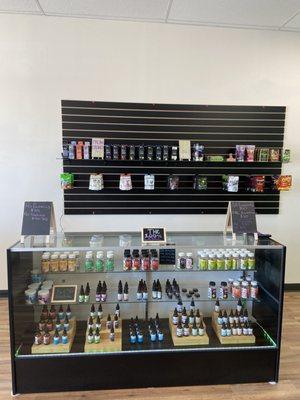 Here is some of our tinctures/drops, and an assortment of delta 9/ CBD gummies. We also have some pet products in this counter as well!