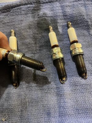 Bad spark plug from fuel.