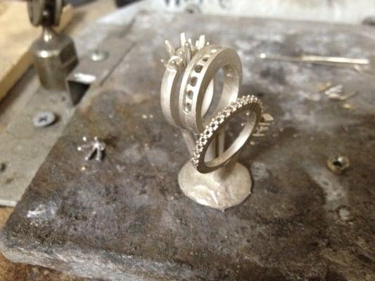 3 custom rings just out of casting before the polishing and setting.