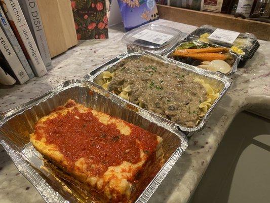 Prepared eggplant lasagna, beef stroganoff, roasted vegetable medley, deviled eggs and tiramisu.