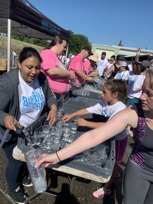 Water station. Cups were filled with tap from a giant bag. The same bags used to fill the bubble contraptions.