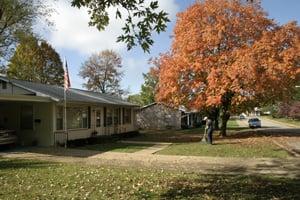 Staff raking leaves at Farmington Presbyterian Manor.