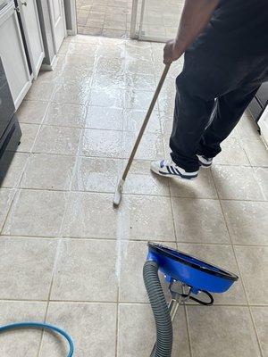 We manually lift loosen, all dirt before using the tile  and grout cleaning machine