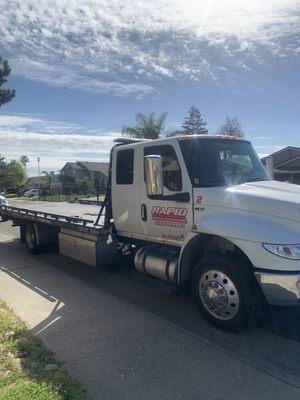 The truck towed my vehicle.