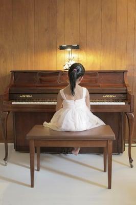 A Pupil Playing the Piano