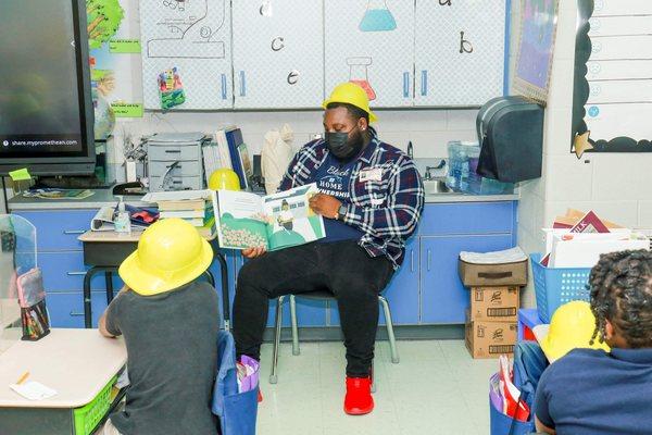 RaySean reading to the kids during REALTIST week.