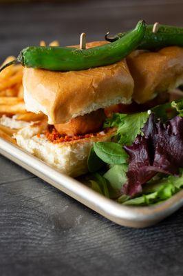 Vada Pav. Spiced potato dumpling sandwiches topped w/masala mix and special garlic chutney. Served w/masala fries and side salad.