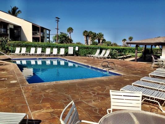 Lower swimming pool surrounded by large flagstone deck - perfect for soaking up the sun.