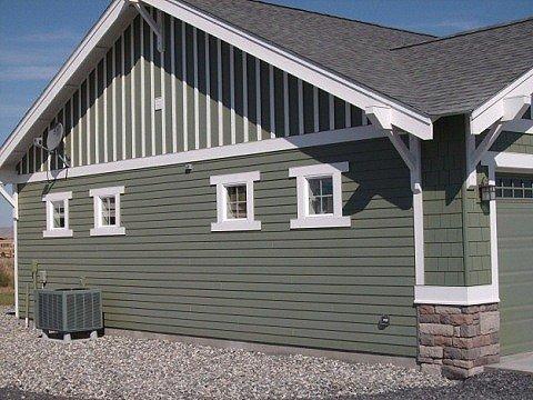 Knee braces and board and batt siding typical of craftsman type homes