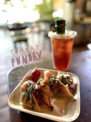 Open faced smoked salmon sandwich and iced tea.