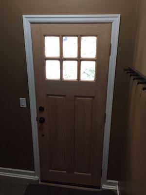 Simpson wood craftsman style entry door.