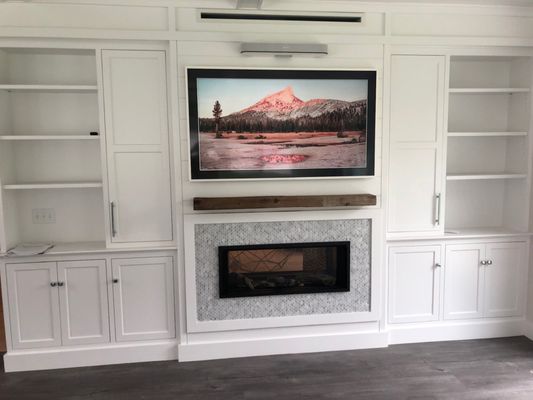 Samsung Frame TV with Sonos Beam above TV