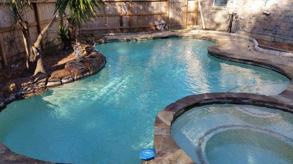 A beautiful after shot of this family's pool, ready to relax in.