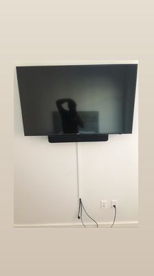 Tv mounting with wire cover.