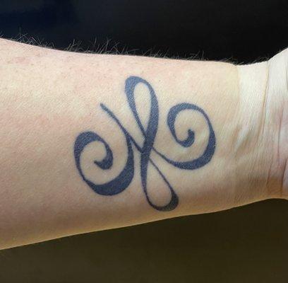 Wrist tattoo.  He mixed the perfect color.  Line work is great. Just what I wanted!