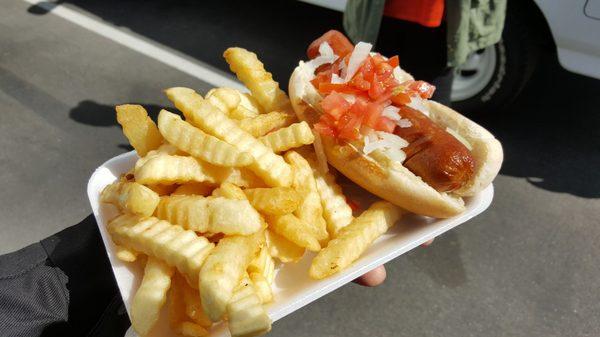 Hot dog with mayo and toppings, and fries