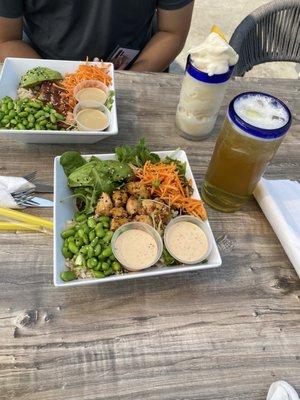 Salmon and chicken bowl with honey dew and lemonade smoothie