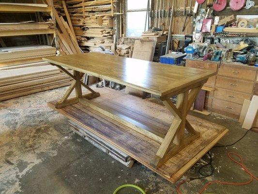 A custom built farmhouse style table made to the customers specifications.