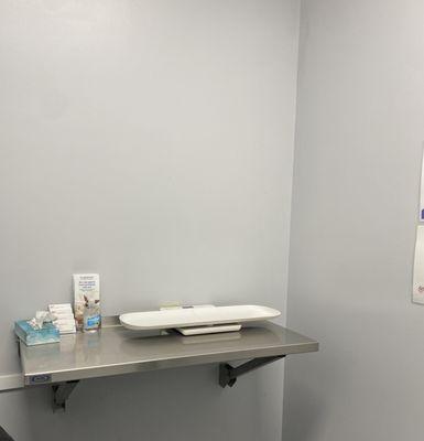 Exam table in room