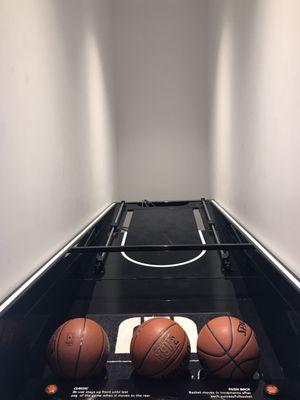 Basketball toss game in the back.