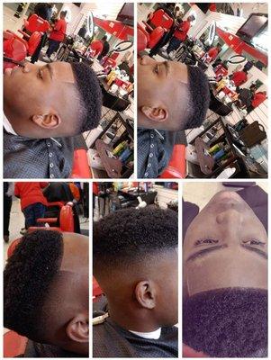 High top fade with curl top and black spray