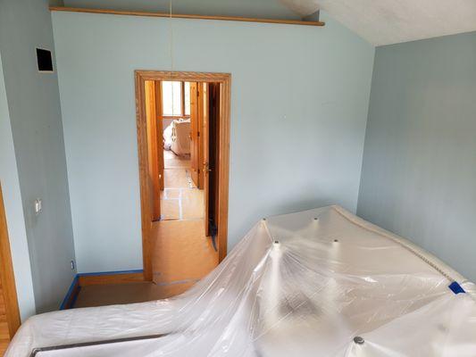 Our process of covering your furniture and floors for paint.