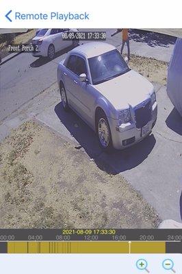 Pointing the blower directly in front of our driveway blowing leaves and dirt as he walks away