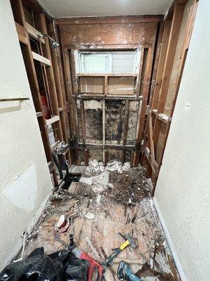 Bathroom before renovation but after demolition