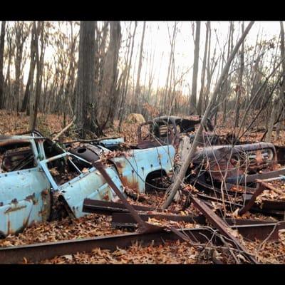 Two old cars off GE trail.