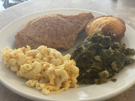 Fried pork chop dinner served with two sides of your choice.