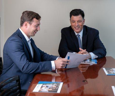 Brian and Joe preparing for a meeting