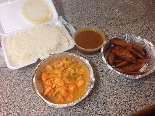 White rice, Beans, sweet plantains, and sautéed shrimp .