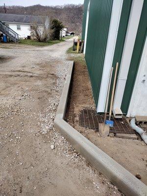 Finished product at Paden City Fire Department. 75 feet of 24"x6" curb.