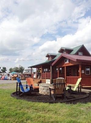 We have a large display of lifetime warranty recycled Poly furniture, and several fully furnished recreational log cabin displays!