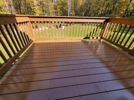 After Photo: after this deck has sat for a season to acclimate CPU sanded it smooth and applied two coats of stain that will last.